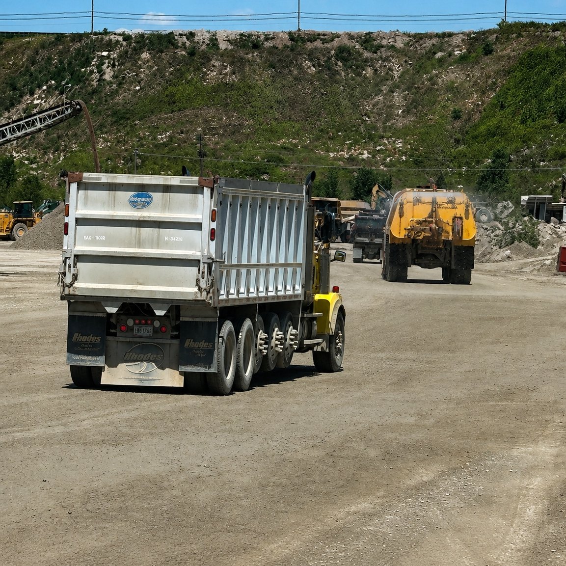 Loaded truck crossing the quarry yard