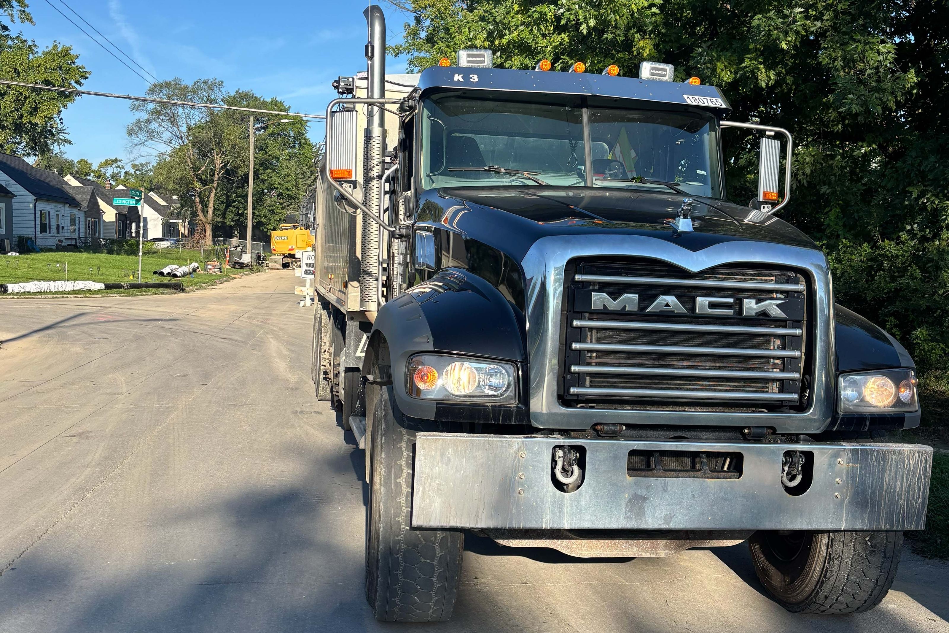 Mack truck head-on at a neighborhood roadwork site